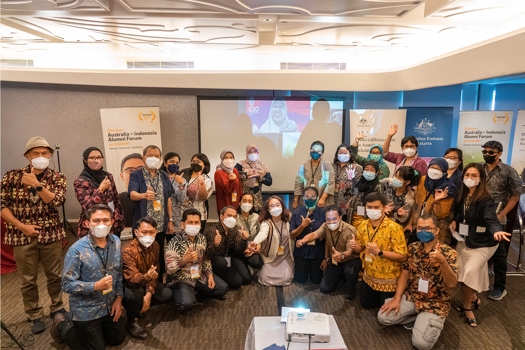 A group photo of AGS recipients, DFAT and Ministry of State Secretariat representatives, and the AGS team taken in the workshop room