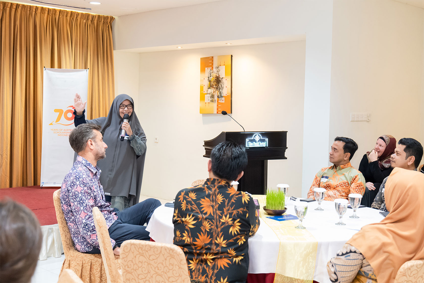 Dr Cut Dewi, a distinguished alumna, captivates the audience with her speech, unravelling the transformative chapters of her Australian study journey and its profound impact on her career.