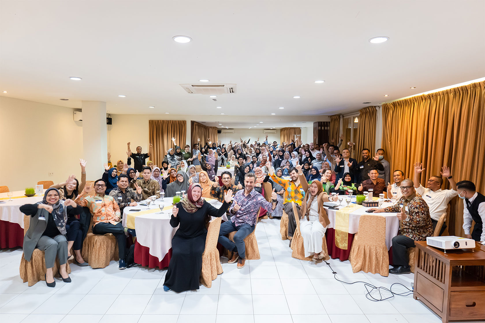 Our alumni gather for a group photo with the Australian Embassy representatives, including the Deputy Ambassador, Mr Stephen Scott, the MC and Counsellor for Human Development, Ms Hannah Derwent, and the First Secretary of Scholarships and Alumni, Ms Emily Whelan.