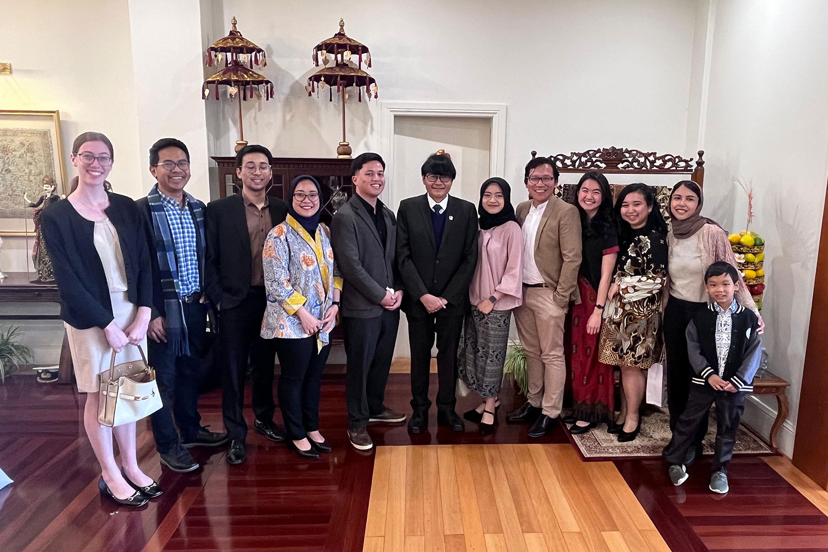 Recipients of the G20 “Recover Together, Recover Stronger” Scholarships take a photo with Indonesian Ambassador to Australia, Mr Siswo Pramono.
