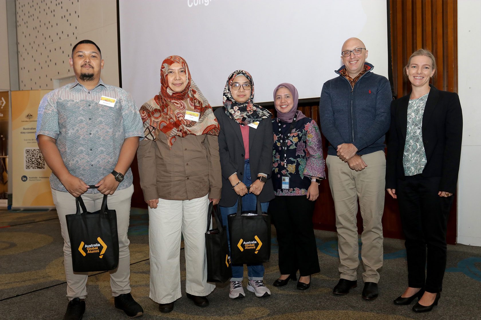 Winners of the ‘Share your Research Competition’ take a picture with the judges from Australia Awards in Indonesia and Australian Embassy Jakarta