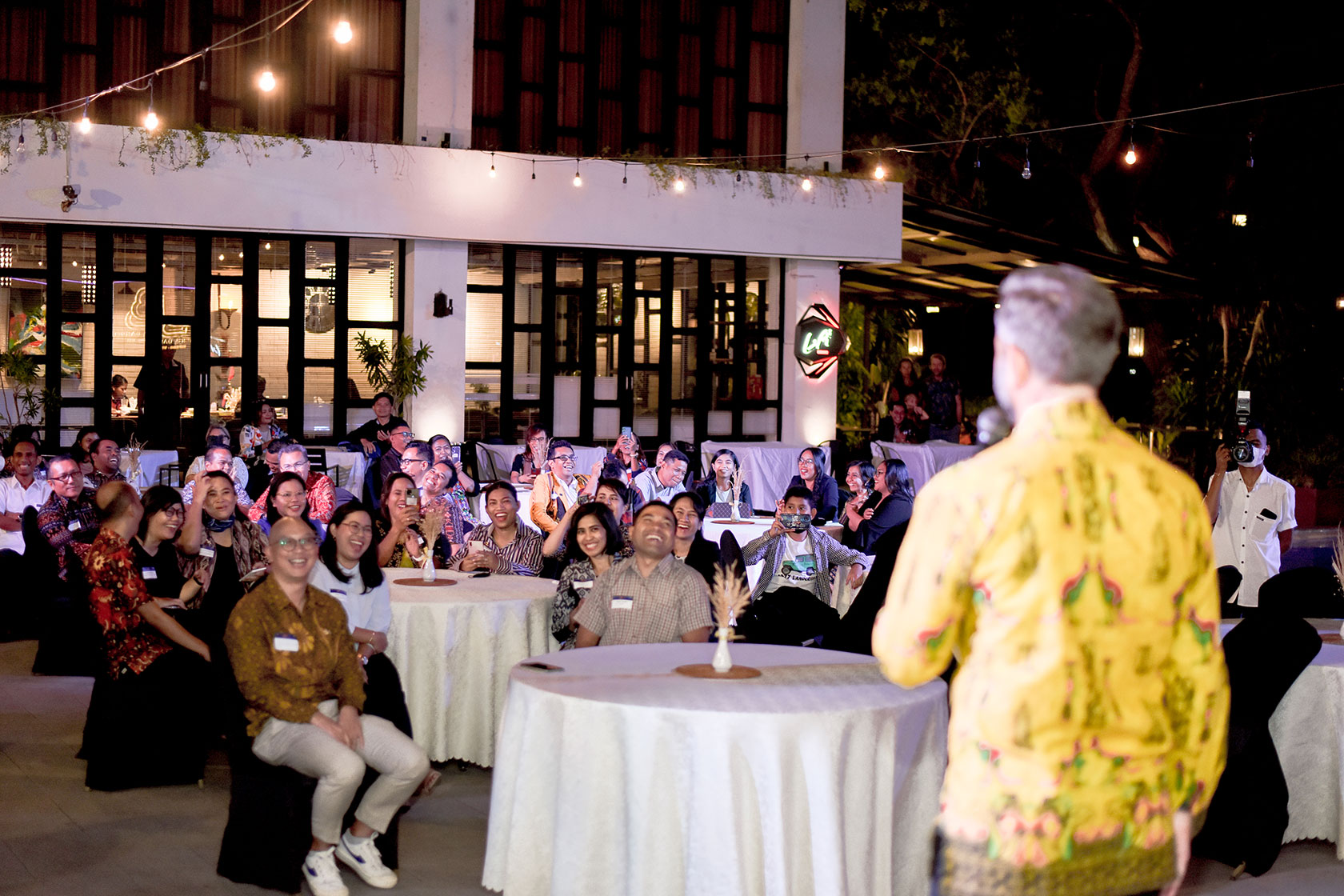 Happy faces of participants of the Alumni Networking Dinner in Kupang while listening to the opening remark from the Australian Deputy Ambassador to Indonesia Mr Stephen Scott