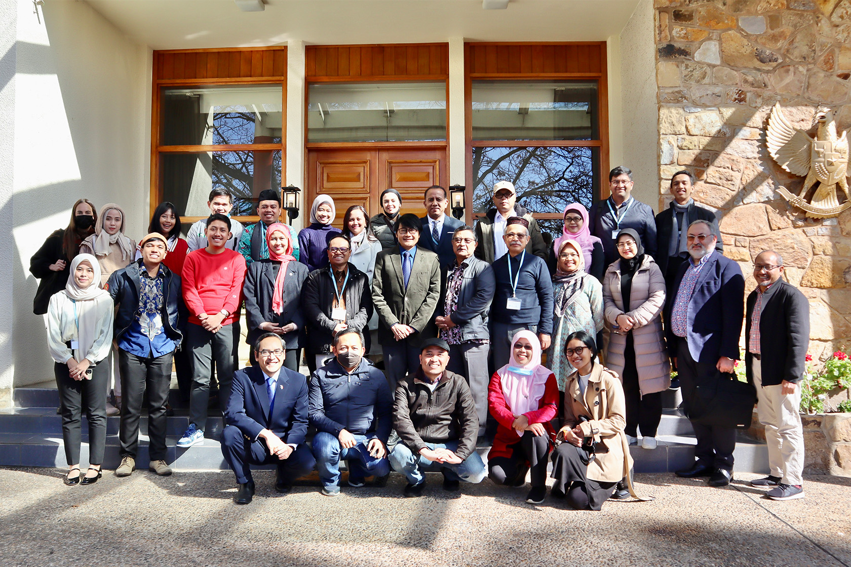 A group photo of participants with Siswo Pramono, Ambassador of Indonesia to Australia, taken in front of the Indonesian Embassy in Canberra building