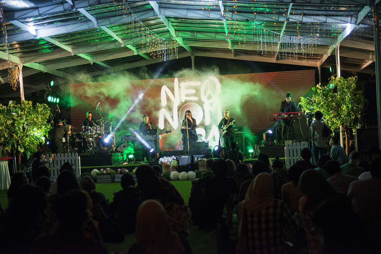 A band is performing for the audience