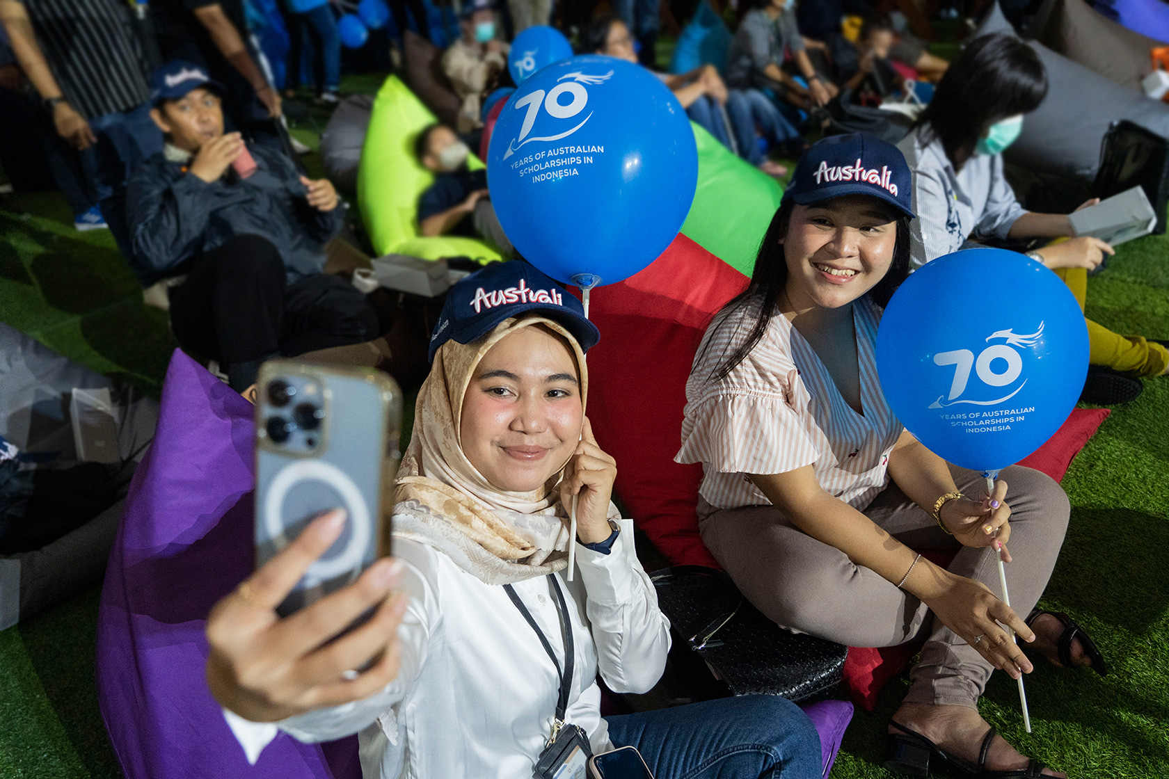 Alumni captured the moment by taking a wefie.